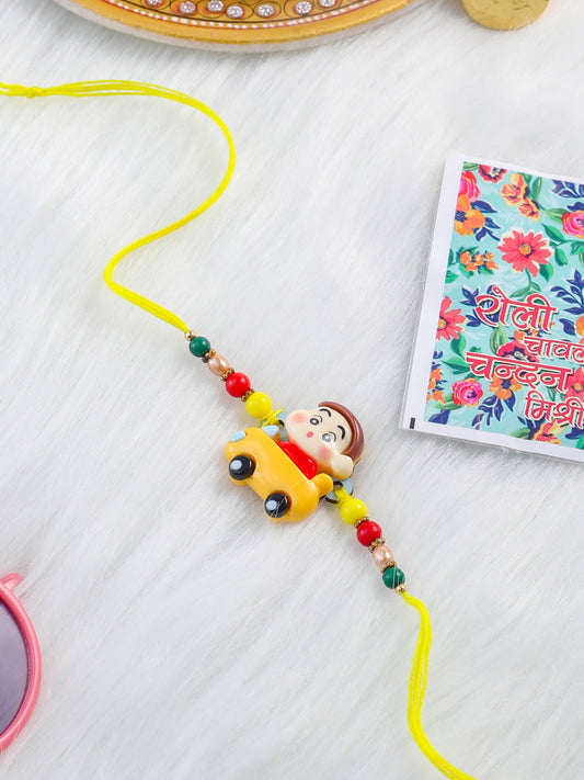 NVR Kids Yellow Cartoon Artificial Beads Rakhi with Roli Chawal Chandan & Mishri