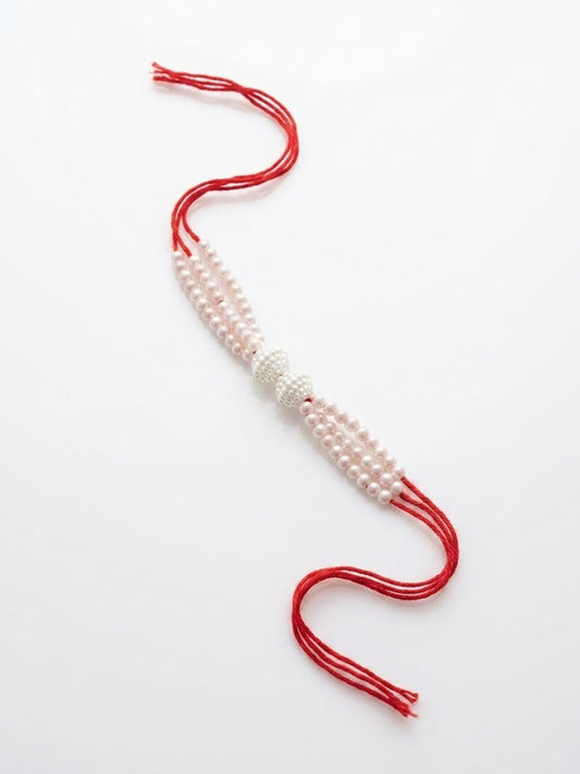 NVR White Pearls & Red Thread Rakhi with Roli Chawal Chandan Mishri