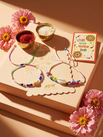 NVR Set of 2 Artificial Beads Thread Rakhi With Roli Chawal Chandan Mishri