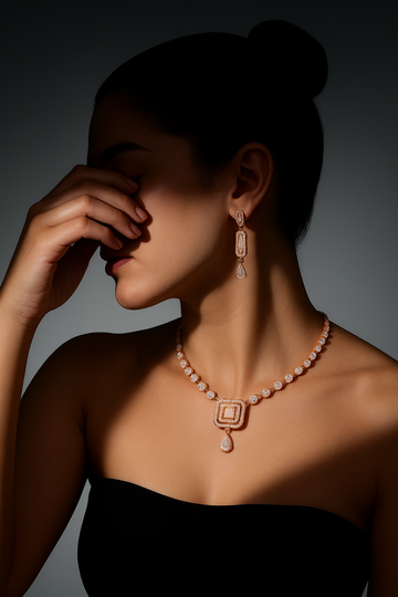 NVR Women Gold-Plated American Diamond Studded Handcrafted Jewellery Set