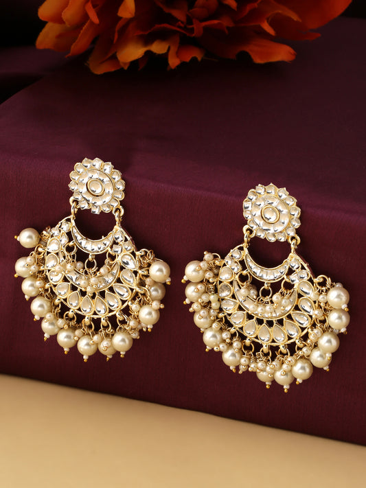 NVR gold toned and white kundan studded and beaded crescent shaped chandbalis Earrings