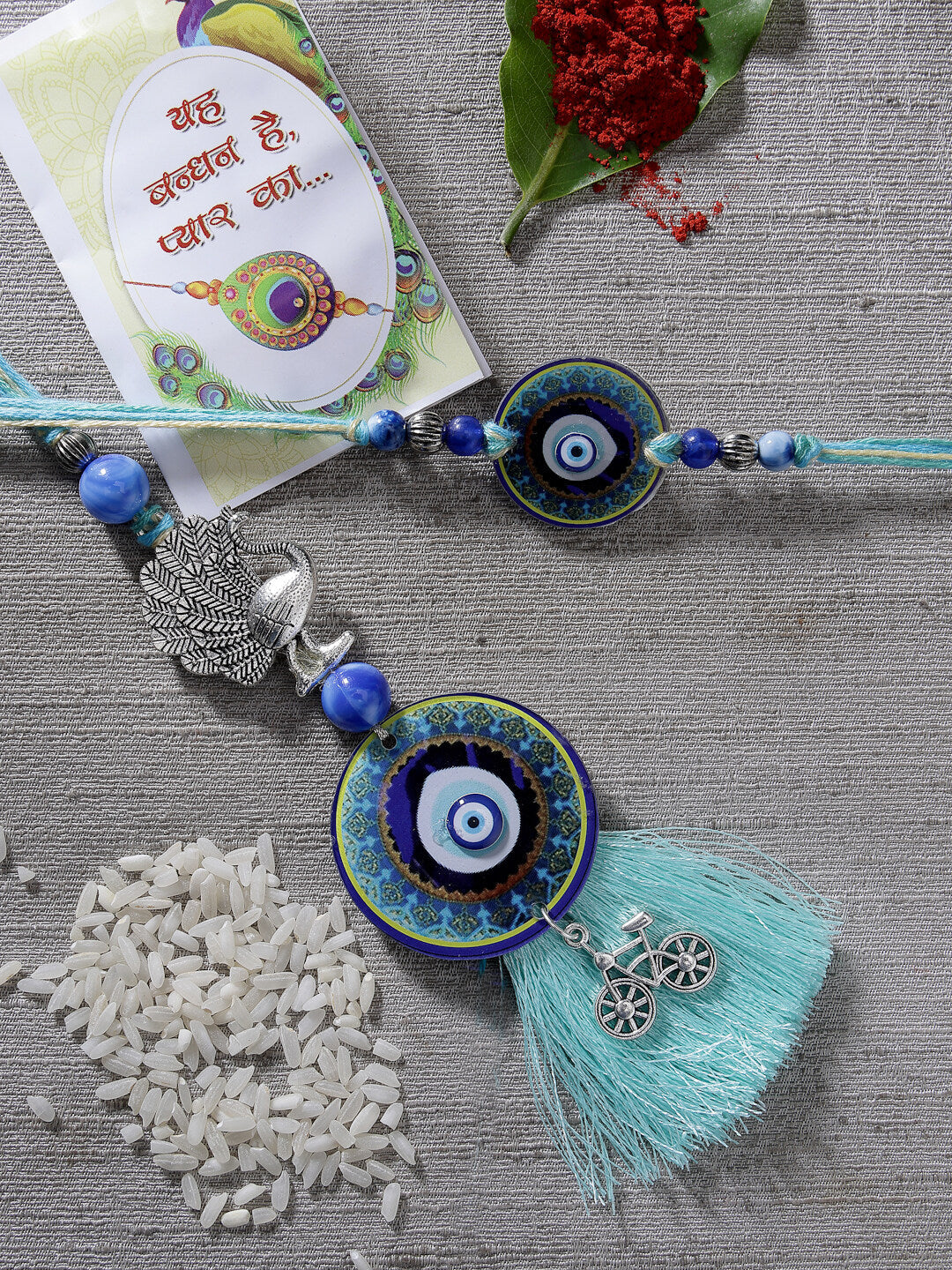 NVR Unisex Set of 2 Blue Evil Eye & Beaded Bhaiya Bhabi Rakhi With Roli Chawal & Chocolate