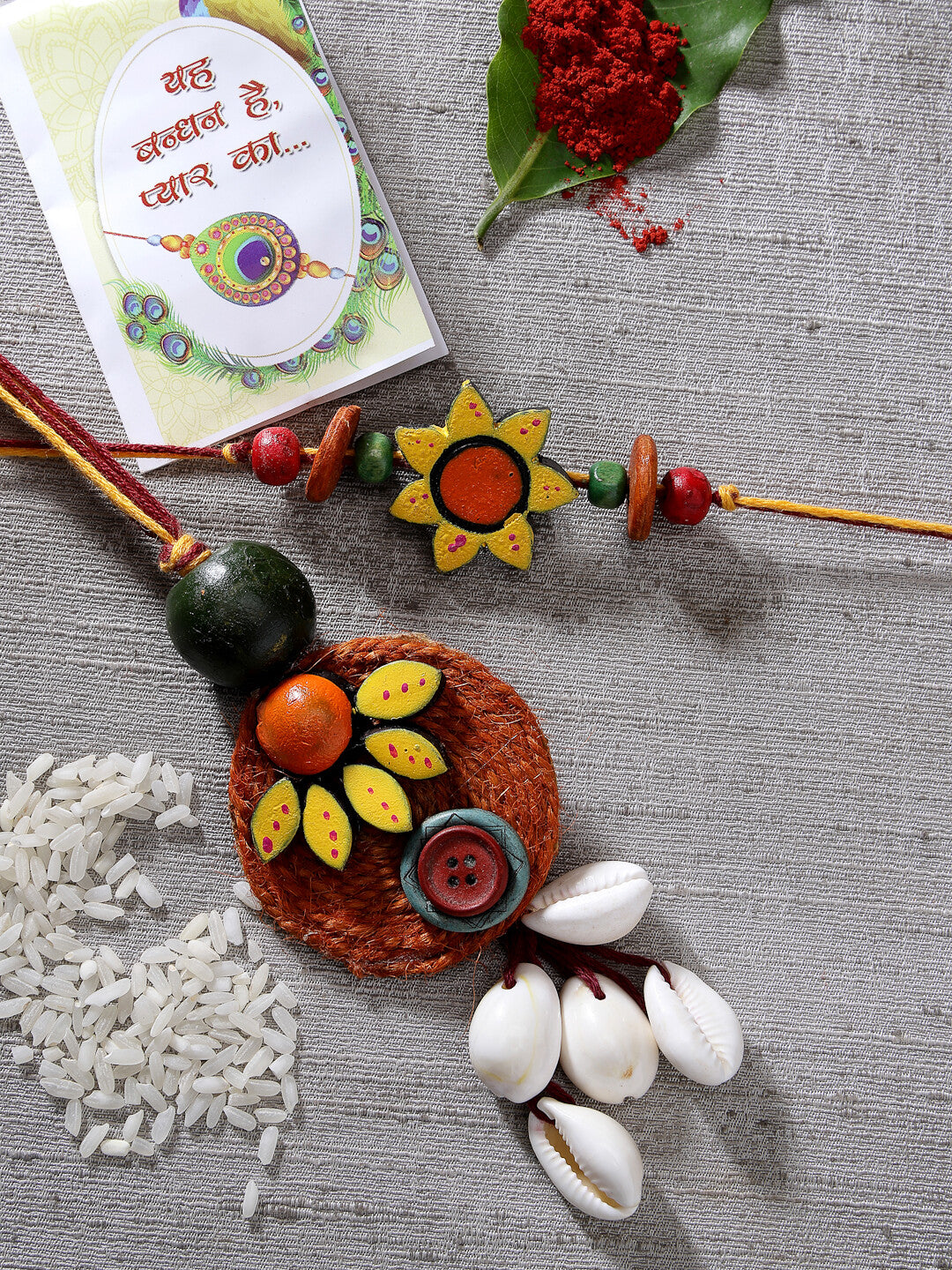 NVR Unisex Set of 2 Multicolor Sea Shell  Handcrafted  Bhaiya Bhabhi Rakhi With Roli Chawal & Chocolate