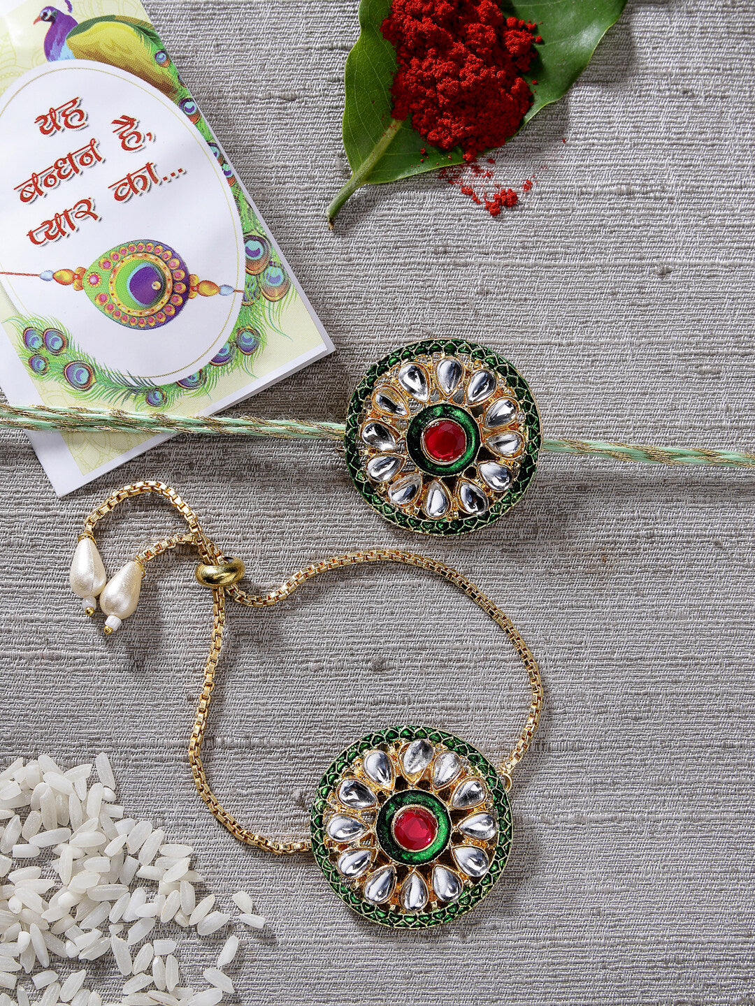 NVR Unisex Set of 2 Gold Kundan-Studded Handcrafted Wraparound Rakhi Set With Roli Chawal & Chocolate