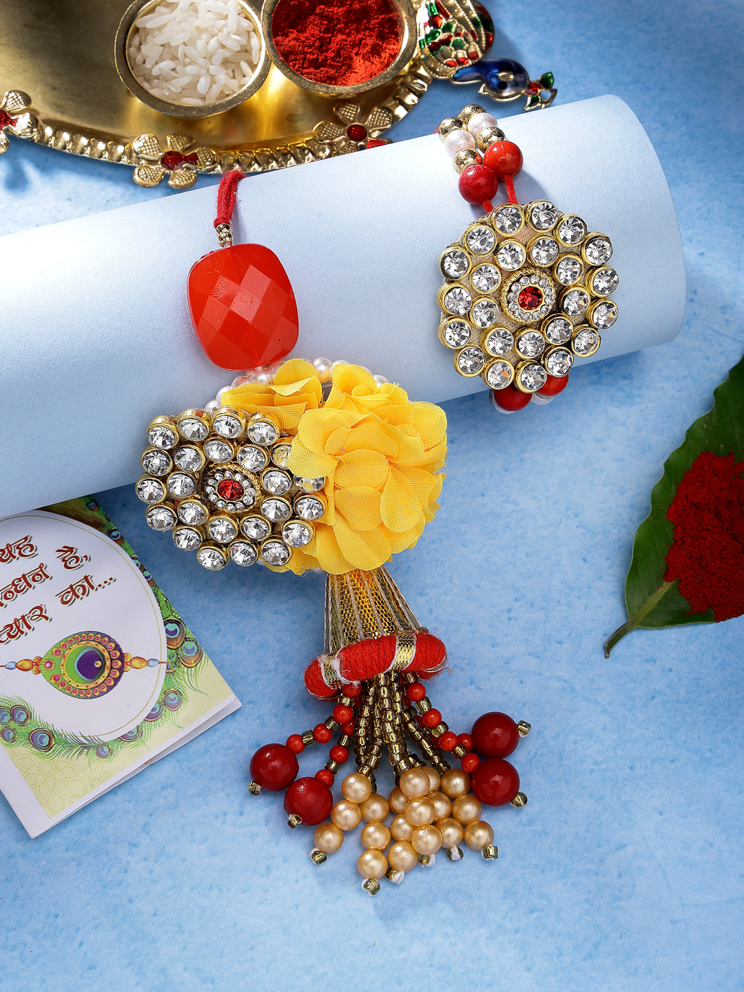 NVR Unisex Set of 2 Red & Gold-Toned Stone-Studded & Beaded Bhaiya Bhabhi Rakhi With Roli Chawal & Chocolate