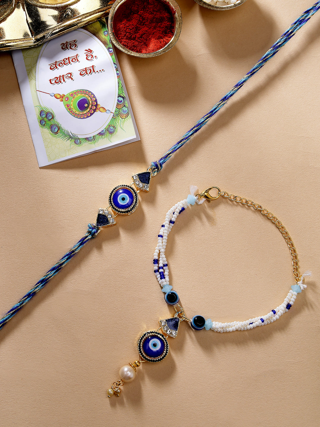 NVR Unisex Set of 2 Blue Evil Eye Bhaiya Bhabhi Rakhi With Roli Chawal & Chocolate