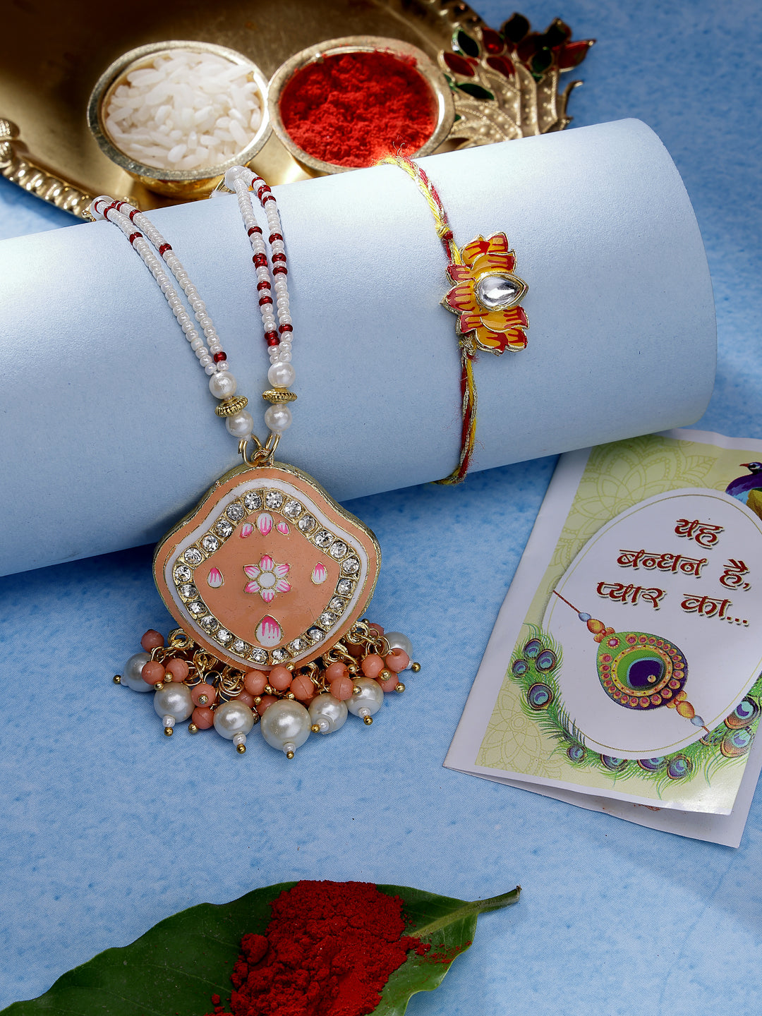 NVR Unisex Set of 2 Peach Lotus Shape Kundan Stone-Studded & Beaded Bhaiya Bhabhi Rakhi With Roli Chawal & Chocolate