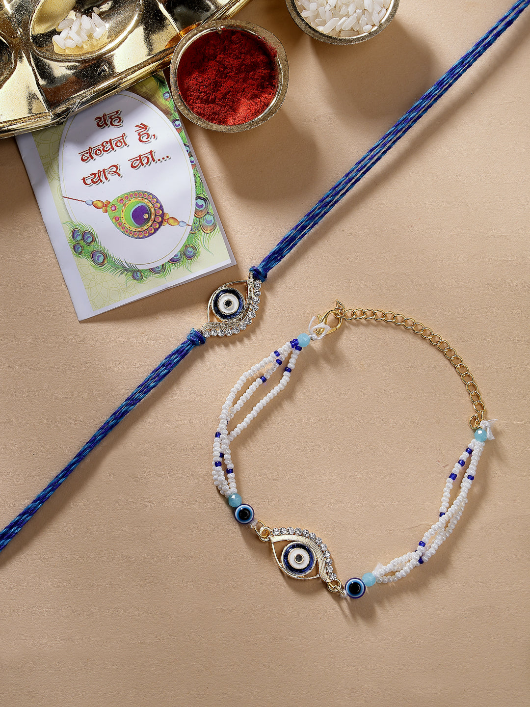 NVR Unisex Set of 2 Blue Evil Eye Bhaiya Bhabhi Rakhi Set With Roli Chawal & Chocolate