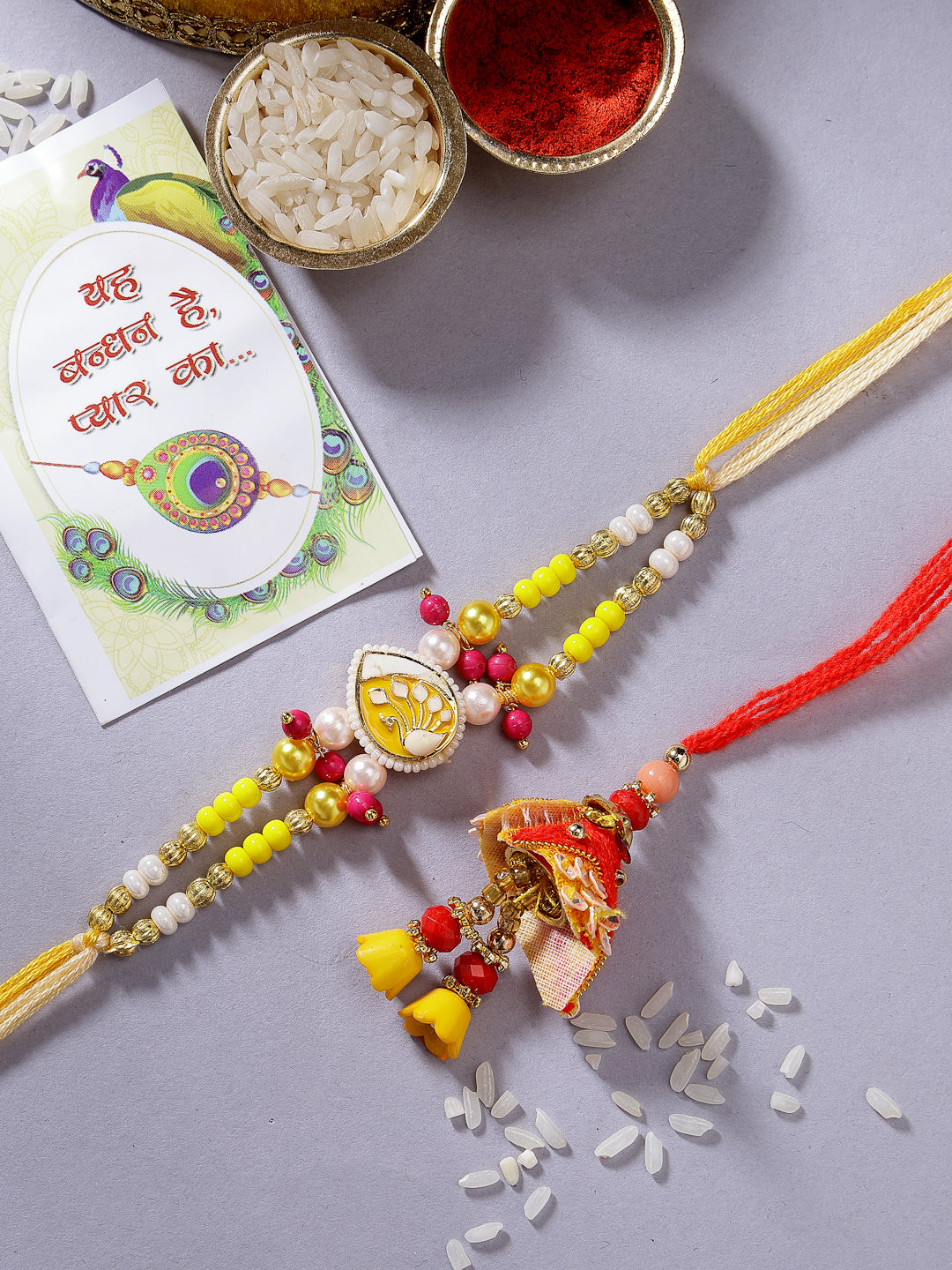 NVR Unisex Set of 2 Yellow Peacock Design Bhaiya Bhabhi Rakhi With Roli Chawal & Chocolate