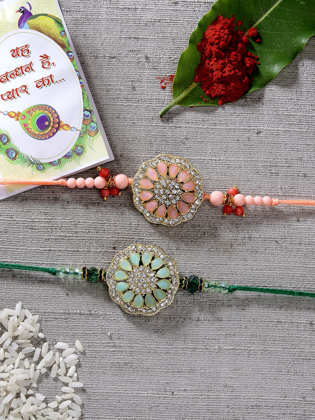 NVR Men Set of 2 Pink & Green Stone-Studded Rakhi With Roli Chawal & Chocolate