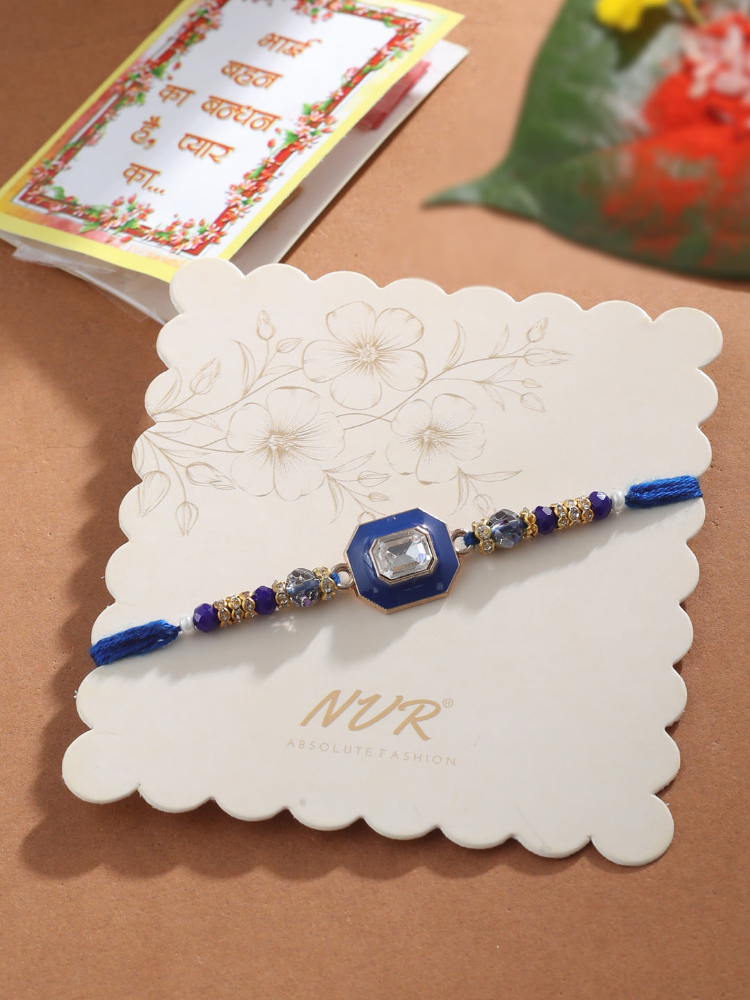NVR Men Blue Artificial Stones Handmade Thread Rakhi with Roli Chawal Chandan & Mishri