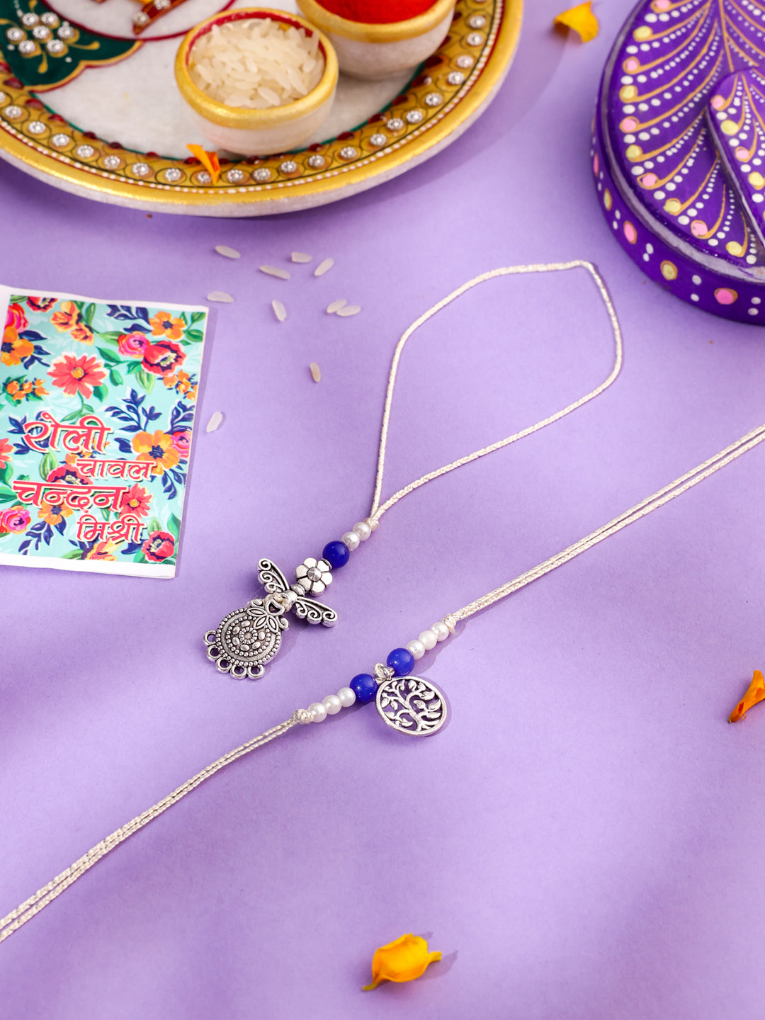 NVR Set of 2 Silver Toned Pearls & Beads Bhaiya Bhabhi Rakhi with Roli Chawal Chandan & Mishri