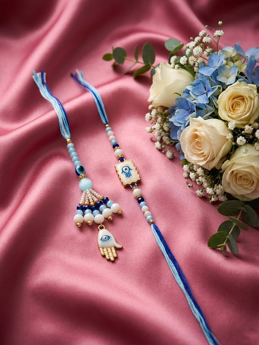 NVR Set of 2 Evil Eye Hand Design Bhaiya Bhabhi Rakhi with Roli Chawal Chandan Mishri