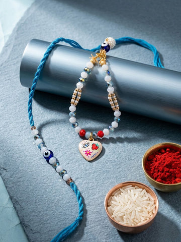 NVR Set of 2 Evil Eye Beaded Gold Toned Bhaiya Bhabhi Rakhi With Roli Chawal Chandan