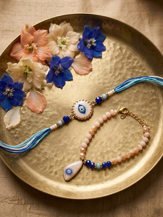 NVR Set of 2 Gold Toned Evil Eye Beaded Bhaiya Bhabhi Rakhi With Roli Chawal Chandan