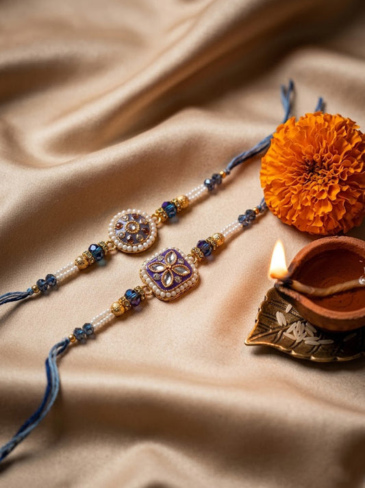 NVR Set of 2 White Pearls Thread Rakhi with Roli Chawal Chandan Mishri