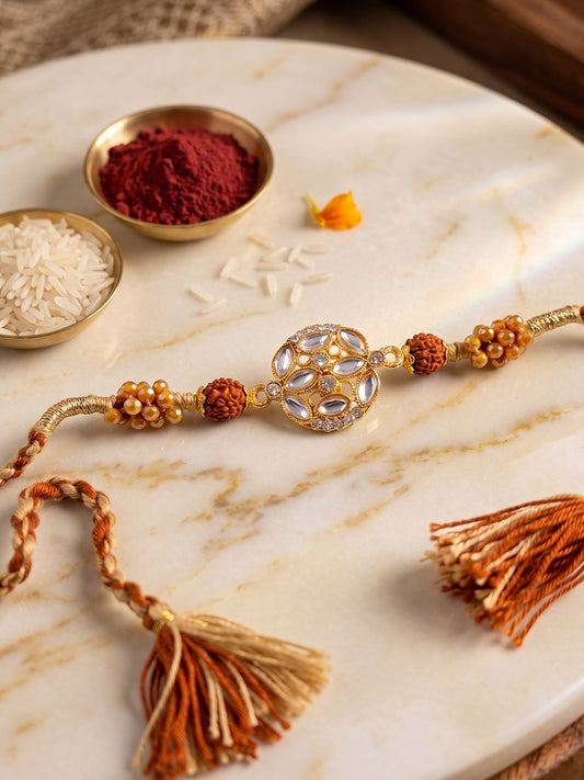 NVR Rudraksh & Kundan Studded Gold Toned Thread Rakhi with Roli Chawal Chandan Mishri