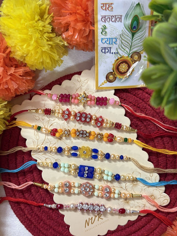 NVR Set of 7 Multicolor Designer Thread Rakhi with Roli Chawal Chandan Mishri