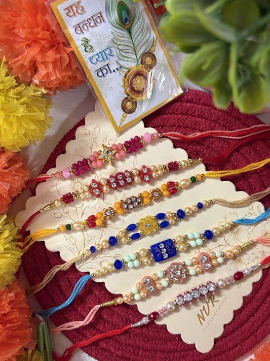 NVR Set of 7 Multicolor Designer Thread Rakhi with Roli Chawal Chandan Mishri