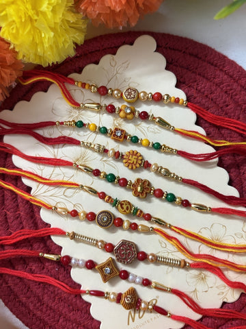 NVR Set of 10 Multicolor Designer Thread Rakhi with Roli Chawal Chandan Mishri