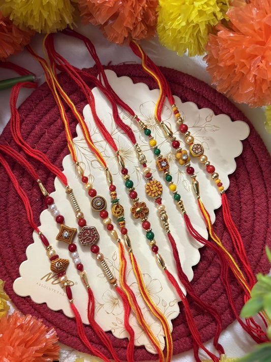 NVR Set of 10 Multicolor Designer Thread Rakhi with Roli Chawal Chandan Mishri