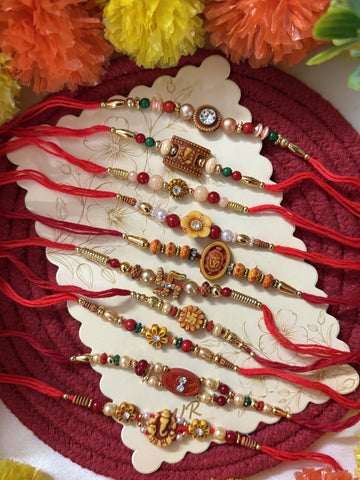 NVR Set of 10 Multicolor Designer Thread Rakhi with Roli Chawal Chandan Mishri