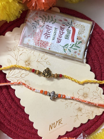 NVR Set of 2 Multicolor Religious Thread Rakhi with Roli Chawal Chandan Mishri