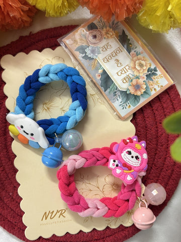 NVR Set of 2 Blue & Pink Kids Rakhi with Roli Chawal Chandan Mishri
