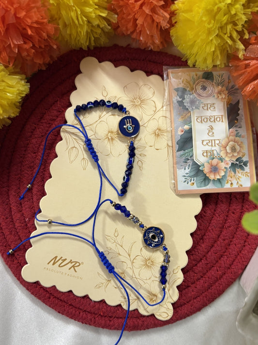 NVR Set of 2 Blue Evil Eye Thread Rakhi With Roli Chawal Chandan Mishri