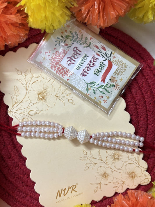 NVR White Pearls & Red Thread Rakhi with Roli Chawal Chandan Mishri