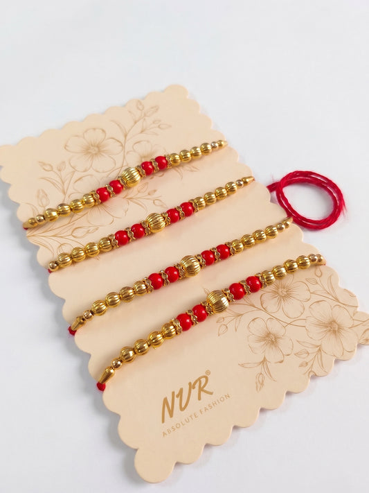 NVR Set of 4 Artificial Beads Red Thread Rakhi With Roli Chawal Chandan Mishri