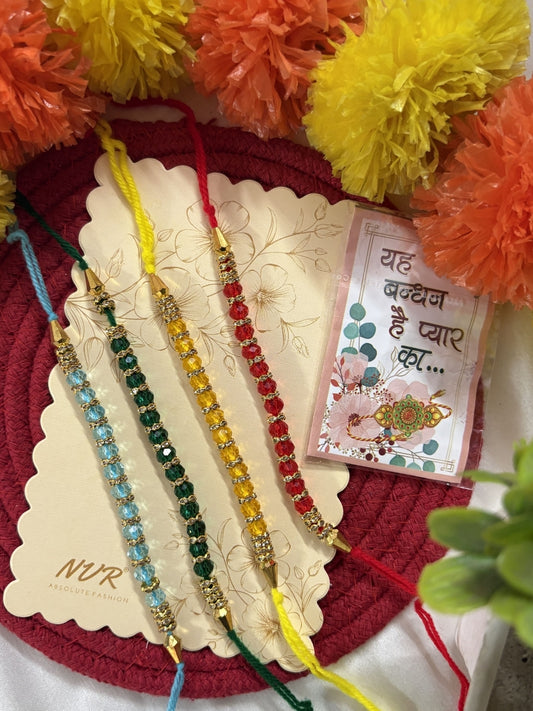 NVR Set of 4 Multicolor Artificial Beads Thread Rakhi with Roli Chawal Chandan Mishri