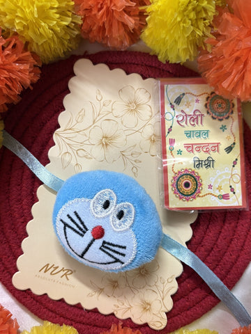 NVR Kids Doremon Design Thread Rakhi With Roli Chawal Chandan Mishri