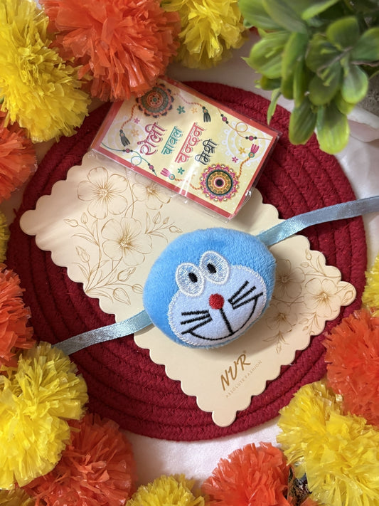 NVR Kids Doremon Design Thread Rakhi With Roli Chawal Chandan Mishri