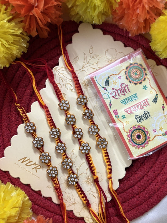 NVR Set of 4 Artificial Stones Floral Design Thread Rakhi with Roli Chawal Chandan Mishri