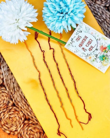 NVR Set of 4 Red & Yellow Thread Rakhi with Roli Chawal Chandan Mishri