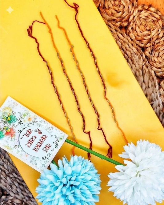 NVR Set of 4 Red & Yellow Thread Rakhi with Roli Chawal Chandan Mishri