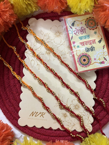 NVR Set of 4 Yellow & Red Thread Rakhi with Roli Chawal Chandan Mishri