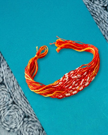 NVR Set of 6 Red & Yellow Thread Rakhi with Roli Chawal Chandan Mishri