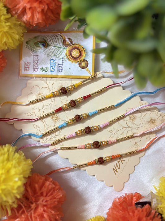 NVR Set of 6 Rudraksh & Artificial Beads Thread Rakhi with Roli Chawal Chandan Mishri