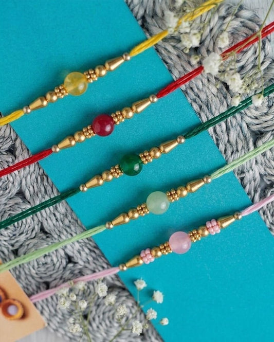 NVR Set of 5 Multi Artificial Beads Thread Rakhi with Roli Chawal Chandan Mishri