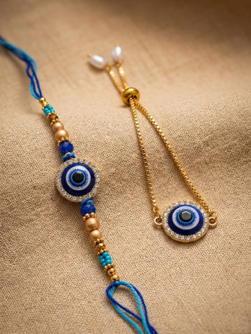 NVR Set of 2 Blue Evil Eye Gold Toned Bhaiya Bhabhi Rakhi with Roli Chawal Chandan Mishri