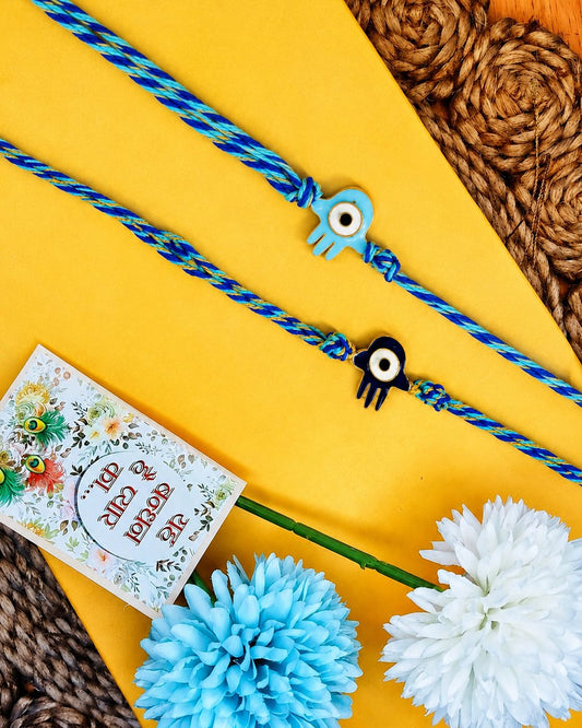 NVR Set of 2 Evil Eye & Blue Thread Rakhi with Roli Chawal Chandan Mishri