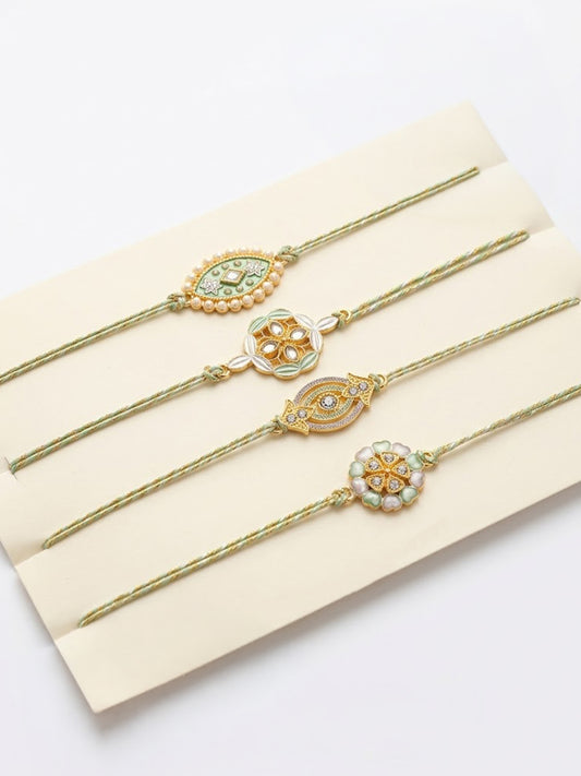 NVR Set of 4 White Artificial Stones & Green Thread Rakhi with Roli Chawal Chandan Mishri