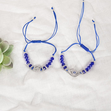 NVR Unisex Set of 2 Blue Evil Eye Rakhi With Roli Chawal