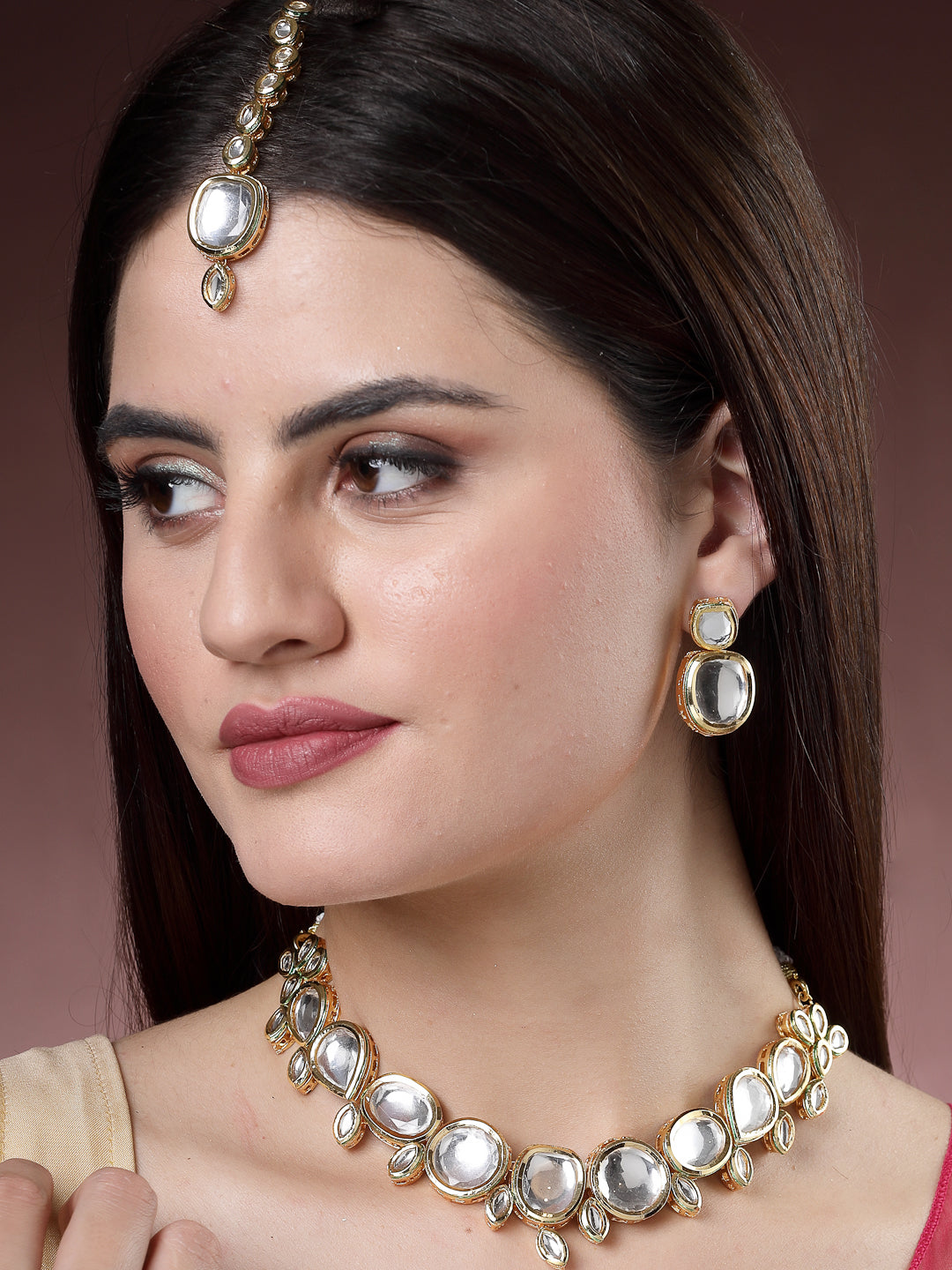 NVR Women Gold Kundan-Studded Necklace and Earrings with Mang Tikka