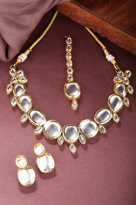 NVR Women Gold Kundan-Studded Necklace and Earrings with Mang Tikka