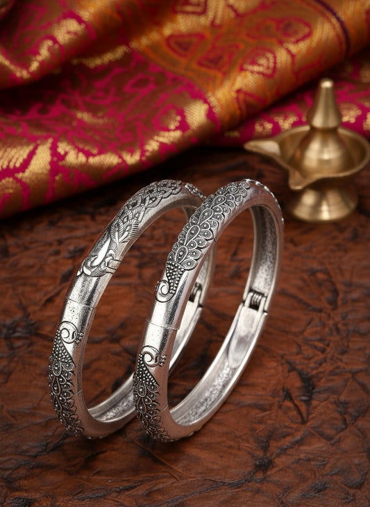 NVR Women Set of 2 Silver-Toned German Silver Peacock Design Oxidised Kada Bangle