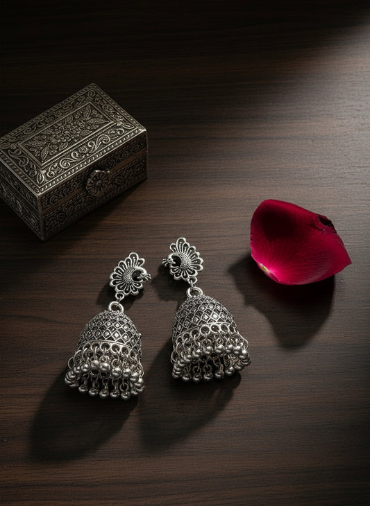 NVR Women Silver Toned Peacock Design German Silver Oxidised Dome Shaped Jhumka Earrings