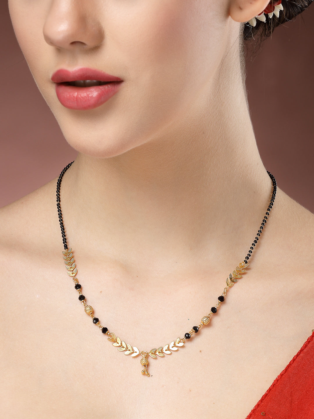 NVR Women Short Mangalsutra Designs Gold Plated & Black Beaded Mangalsutra